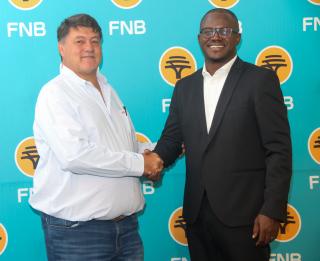 WINDHOEK, 19 March 2026 -  Organiser of the Namibia Street Classic Henk Botha (left) and FNB Namibia’s Chief Executive Officer for Retail Banking, Mbo Luvindao poses for a picture during the sponsorship announcement of the maiden edition of the event. FNB Sponsored the event with N.dollars 2 million. (Photo by: Hesron Kapanga) NAMPA