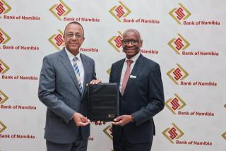 WINDHOEK, 24 MARCH 2026 - Governor of the Bank of Namibia and Navachab Gold Mine managing director George Botshiwe pose for a photo after signing a Memorandum of Understanding. (Photo: Contributed) NAMPA