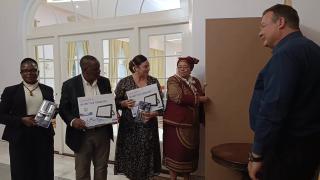 WINDHOEK, 26 March 2026 - Vice president Lucia Witbooi (second from left) receives donated equipment bound for Mokganedi Tlhabanelo High School from Pupkewitz Megabuild's Financial Director, Danie Du Toit (right). (Photo by: Ali Negumbo) NAMPA