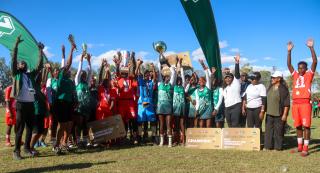 KEETMANSHOOP, 06 April 2026 - The Erongo Region's Under-20 football team and Kavango East netball team pictured after being crowned winners of the 2026 Nedbank Namibian Newspaper Cup at the Westdene Stadium in Keetmanshoop. Erongo won the match 2-1 against Kunene while Kavango defeated Khomas 35-28. (Photo by: Hesron Kapanga) NAMPA