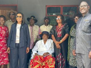OSHAKATI, 13 April 2026 - Ohangwena regional governor Kadiva Hamutumwa with the representatives from the regional council and the Lucia Petrus (seated) during the official handover of the one bedroom house to Lucia Petrus at Oshandi village in Ondobe constituency. (Photo: contributed) 