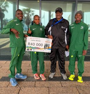 GQEBERHA, 27 June 2026 - From left to right Daniel Paulus, Lavinia Haitopa, Berthold Karumendu, Simon Mathias poses for a picture after completing the 2026 Nelson Mandela Bay Half Marathon in Gqeberha, South Africa. Haitope won the women's race while Paulus and Mathias placed seventh and 12th respectively. (Photo: contributed) NAMPA 