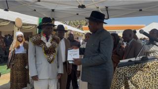 NDIYONA, 27 June 2026 - The Minister of Urban and Rural Development James Sankwasa hands over instruments of authority to the newly installed Gciriku Hompa Aruvita Kayoka on Saturday. (Photo by: Sawi Hausiku) NAMPA 