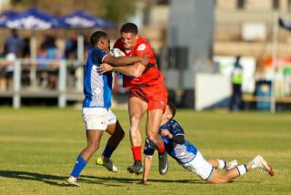 WINDHOEK, 18 July 2026 - Rehoboth rugby club players (in red) in action against Trustco United (in blue) during round eight of the Namibia Rugby Union Premier League at the Trustco United field in Olympia. (Photo by: Hesron Kapanga) NAMPA