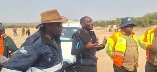 OPUWO, 22 July 2026- Kunene Region Governor Vipuakuje Muharukua, Minister of Works and Transport Veikko Nekundi and Roads Authority Chief Executive Officer Mbahupu Hippy Tjivikua during a briefing following the minister’s inspection of ongoing infrastructure projects in the region. (Photo: Kaviveterue Virere) NAMPA 