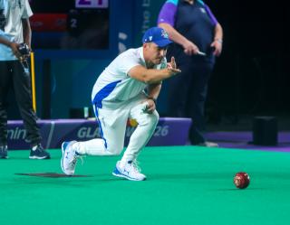 GLASGOW, 23 July 2026 - Waylon Wentzel of Team Namibia bowling during the mens single's match on the opening day of the Glasgow 2026 Commonwealth Games. (Photo by: Hesron Kapanga) NAMPA