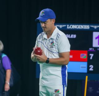 GLASGOW, 23 July 2026 - Waylon Wentzel of Team Namibia bowling during the mens single's match on the opening day of the Glasgow 2026 Commonwealth Games. (Photo by: Hesron Kapanga) NAMPA