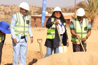 WINDHEOK, 31 JUL (NAMPA) - City of Windhoek Councillors Demetreo Beukes and Nangula Amutenya join Windhoek Rural Constituency Councillor Willem Gariseb to mark the official start of the Groot Aub water pipeline project. (Photo by: Uakutura Kambaekua) NAMPA.