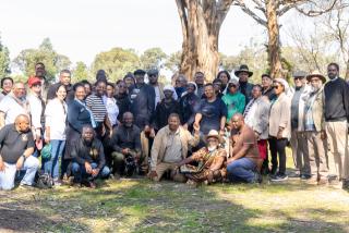 Cape Town, 13 August 2026- Members of the Namibian government delegation, family members, and community representatives pose for a group photo at the cemetery following the successful exhumation of liberation struggle hero Festus Nehale in Cape Town, South Africa, on Thursday, 13 August 2026. (Photo Contributed: MICT) NAMPA