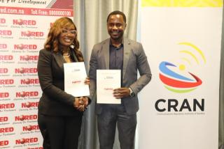 ONDANGWA, 25 August 2026 - Emilia Nghikembua, Communications Regulatory Authority of Namibia's (CRAN) Chief Executive Officer (L); Silvester Wayiti, NORED’s Chief Executive Officer (R) signed a Memorandum of Understanding (MoU) to advance infrastructure developmet. (Photo: Contributed) NAMPA 