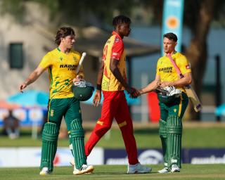 WINDHOEK, 29 August 2026 - South African cricketers Dewald Brevis (left) and teammate Rubin Hermann (right) duirng the T20 Tri-Series campaign at the FNB Namibia Cricket Ground in Olympia, Windhoek. South Africa won the match by 7-wickets. (Photo: Hesron Kapanga) NAMPA