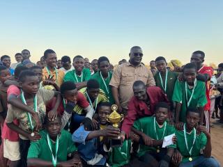 NYONDO, 31 August 2026 - Diva United Football Club showing off their medals and cup they won during the HAM Heroes Cup tournament. The founder of the Cup the councilor of Ndonga Linena Constituency Anselm Marungu is pictured with them. (Photo by: Sawi Hausiku) NAMPA 