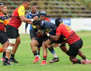 WINDHOEK, 12 September 2026 - Oceans and Oranjemund Rugby Clubs players (in blue/black and orange and red) while in action during the second semifinals of the Namibia Rugby Union (NRU) First Division championship trophy at the Hage Geingob Stadium. Oranjemund won the match 26-19 to qualify for the final against Vipers. (Photo by: Hesron Kapanga) NAMPA
