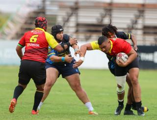 WINDHOEK, 12 September 2026 - Oceans and Oranjemund Rugby Clubs players (in blue/black and orange and red) while in action during the second semifinals of the Namibia Rugby Union (NRU) First Division championship trophy at the Hage Geingob Stadium. Oranjemund won the match 26-19 to qualify for the final against Vipers. (Photo by: Hesron Kapanga) NAMPA
