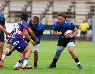 WINDHOEK, 12 September 2026 - Vipers and Keetmanshoop Rams Rugby Clubs players (in blue/dark blue and white, blue and red) while in action during the second semifinals of the Namibia Rugby Union (NRU) First Division championship trophy at the Hage Geingob Stadium. Oranjemund won the match 26-19 to qualify for the final against Vipers. (Photo by: Hesron Kapanga) NAMPA

