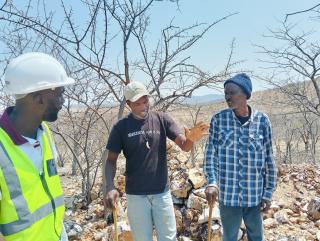 OPUWO, 17 September 2026- Phillip Likando, Personal Assistant to the Governor’s Office, with small-scale miners Burden Jaturire Muharukua and Johnson Kanambunga during an inspection of small-scale mining activities in the Otjorungondo area, Kunene Region, on Thursday. (Photo: Kaviveterue Virere) NAMPA 