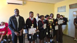 MARIENTAL, 18 September 2026-Learners and coach of /Anes Secondary School pose with their prizes after winning the Junior Secondary Phase at the Hardap Regional Commerce Quiz in Mariental on Thursday. (Photo: Joe-Chintha Garises) NAMPA
