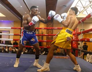 WINDHOEK, 20 September 2026 – Namibia’s World Boxing Organisation (WBO) Global flyweight champion Fillemon Nghutenanye (left) while in action against Berland Robles of the Philippines at the Windhoek Country Club and Resort during the Salute Boxing Promotions’ Building of Champions: Battle for Greatness Boxing Bonanza. Nghutenanye securing a fifth-round technical knockout victory. (Photo: Hesron Kapanga) NAMPA