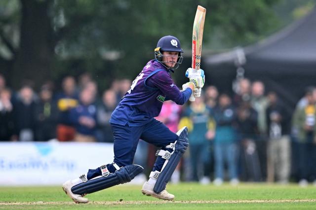 Scotland's Charlie Tear watches the ball after playing a shot during the second Twenty20 International cricket match between Scotland and Australia at the Grange Cricket Club in Edinburgh, Scotland, on September 6, 2024. (Photo by ANDY BUCHANAN / AFP)