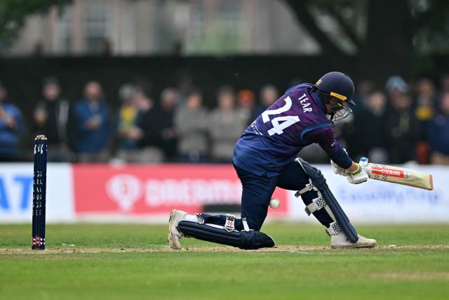 Scotland's Charlie Tear and is out due to a Leg Before Wicket (LBW) during the second Twenty20 International cricket match between Scotland and Australia at the Grange Cricket Club in Edinburgh, Scotland, on September 6, 2024. (Photo by ANDY BUCHANAN / AFP)