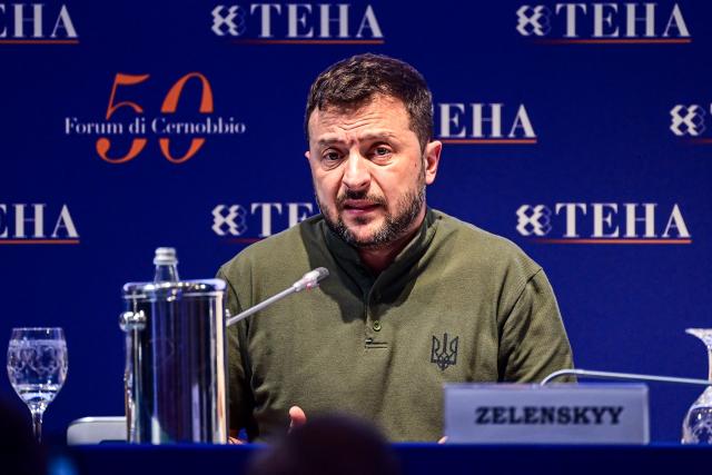 Ukraine's President, Volodymyr Zelensky gestures as he delivers a speech on the opening day of the 50th edition of The European House-Ambrossetti forum, called "Intelligence on the World, Europe, and Italy" at Villa d'Este on lake Como in Cernobbio, northern Italy, on September 6, 2024. The annual three-day event brings together senior figures in business and industry from both Italy and abroad, alongside diplomats and members of government. (Photo by Piero CRUCIATTI / AFP)