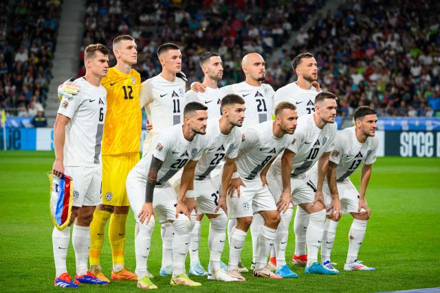 Slovenia’s starting eleven poses for photos prior to the kick off of the Group B3 Nations League football match between Slovenia and Austria at The Stadium Stozice in Ljubljana on September 6, 2024. (Photo by Jure Makovec / AFP)