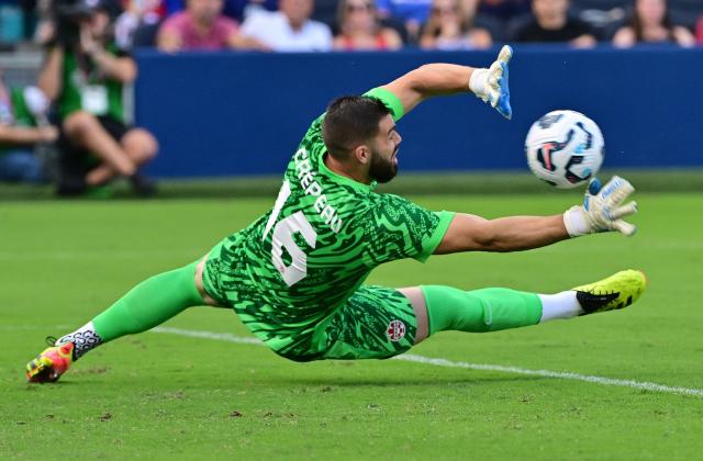 Canada's goalkeeper Maxime Crepeau misses the save on this goal shot by USA midfielder Luca De La Torre (not shown) in the second half  during an international friendly football match between USA and Canada at Children's Mercy Park in Kansas City, Kansas, on September 7, 2024. (Photo by Tim Vizer / AFP)