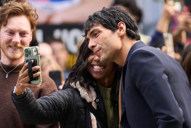 Mexican actor Diego Calva takes photos with fans as he attends the world premiere of "On Swift Horses" at the Princess of Wales theatre during the Toronto International Film Festival in Toronto, Ontario, on September 7, 2024. (Photo by Geoff Robins / AFP)