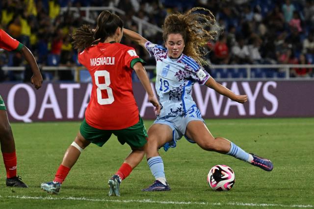 Morocco's midfielder Samya Masnaoui (L) and Spain's forward Laia Martret fight for the ball during the 2024 FIFA U-20 Women's World Cup match between Morocco and Spain at the Pascual Guerrero stadium in Cali, Colombia, on September 7, 2024. (Photo by JOAQUIN SARMIENTO / AFP)