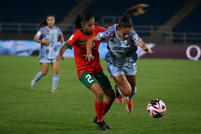 Morocco's defender Fatima-Zahraa Naini (L) and Spain's defender Estela Carbonell fight for the ball during the 2024 FIFA U-20 Women's World Cup match between Morocco and Spain at the Pascual Guerrero stadium in Cali, Colombia, on September 7, 2024. (Photo by JOAQUIN SARMIENTO / AFP)