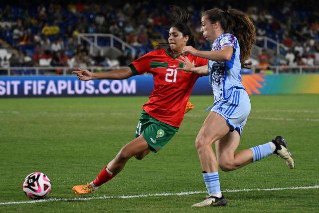 Morocco's defender Hajar Said (L) and Spain's forward Lucia Corrales fight for the ball during the 2024 FIFA U-20 Women's World Cup match between Morocco and Spain at the Pascual Guerrero stadium in Cali, Colombia, on September 7, 2024. (Photo by JOAQUIN SARMIENTO / AFP)