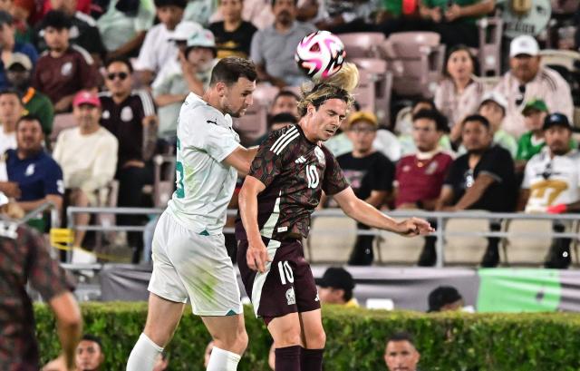 Mexico's #10 Sebastian Cordova vies for the header with New Zealand's Tommy Smith #15 during the international friendly football match between Mexico and New Zealand at the Rose Bowl Stadium in Pasadena, California, on September 7, 2024. (Photo by Frederic J. BROWN / AFP)