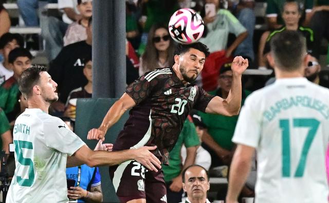 Mexico's #20 Henry Martin vies for the header with New Zealand's Tommy Smith #15 during the international friendly football match between Mexico and New Zealand at the Rose Bowl Stadium in Pasadena, California, on September 7, 2024. (Photo by Frederic J. BROWN / AFP)