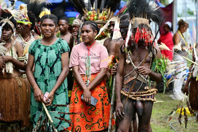 Faithful of the Diocese of Vanimo wait for the arrival of Pope Francis at the Esplanade in front of Holy Cross Cathedral in Vanimo, Papua New Guinea on September 8, 2024. (Photo by Tiziana FABI / AFP)