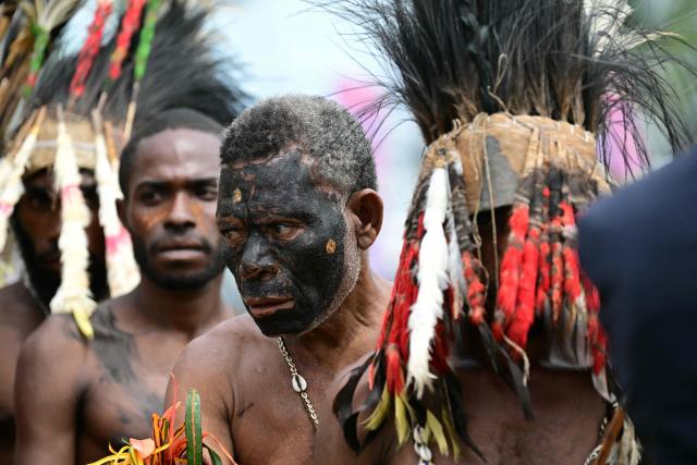 Faithful of the Diocese of Vanimo wait for the arrival of Pope Francis at the Esplanade in front of Holy Cross Cathedral in Vanimo, Papua New Guinea on September 8, 2024. (Photo by Tiziana FABI / AFP)