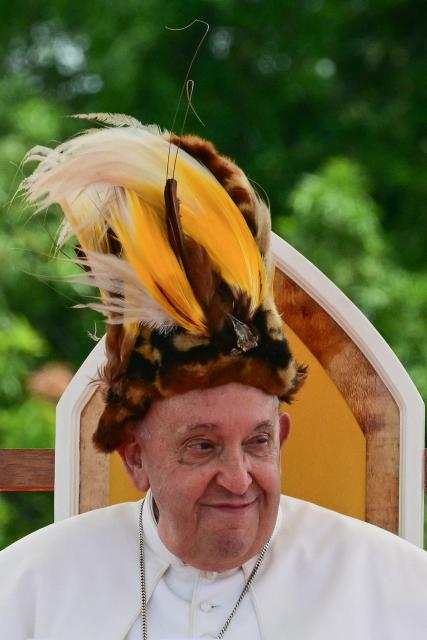 Pope Francis takes part in a meeting with Catholic faithful of the diocese of Vanimo in front of Holy Cross Cathedral in Vanimo, Papua New Guinea, on September 8, 2024. (Photo by Tiziana FABI / AFP)