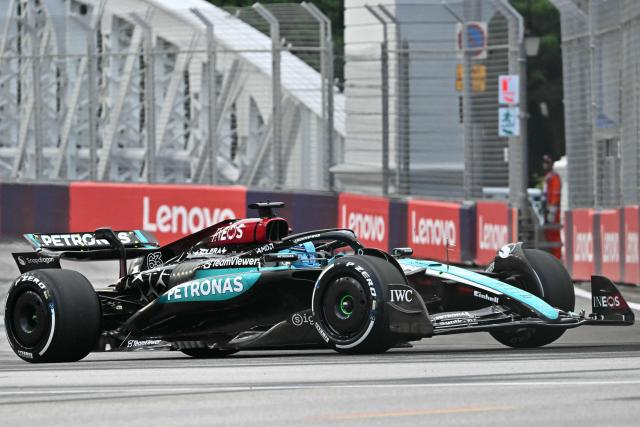 Mercedes' British driver George Russell drives during the first practice session ahead of the Formula One Singapore Grand Prix night race at the Marina Bay Street Circuit in Singapore on September 20, 2024. (Photo by ROSLAN RAHMAN / AFP)