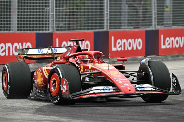 Ferrari's Monegasque driver Charles Leclerc drives during the first practice session ahead of the Formula One Singapore Grand Prix night race at the Marina Bay Street Circuit in Singapore on September 20, 2024. (Photo by ROSLAN RAHMAN / AFP)