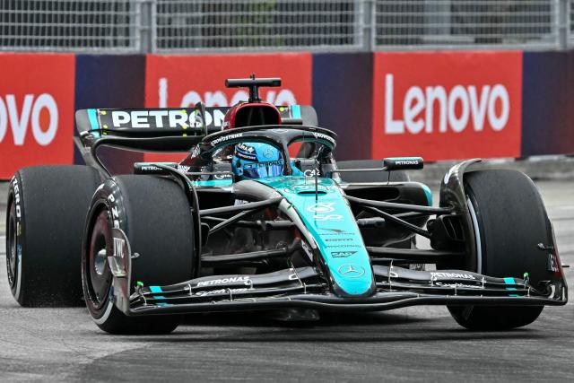 Mercedes' British driver George Russell drives during the first practice session ahead of the Formula One Singapore Grand Prix night race at the Marina Bay Street Circuit in Singapore on September 20, 2024. (Photo by ROSLAN RAHMAN / AFP)