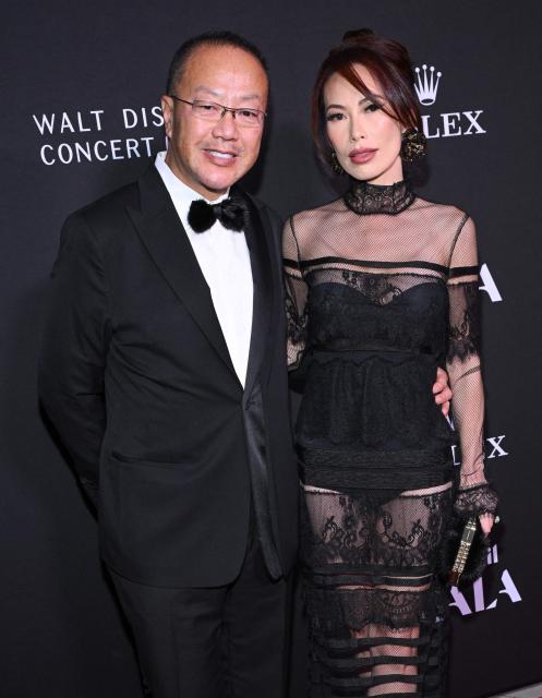 Plastic surgeon and philanthropist Gabriel Chiu and his wife US-Taiwanese producer Christine Chiu attend the Los Angeles Philharmonic Gala Concert to kick-off the 2024/25 season at the Walt Disney concert hall in Los Angeles, October 1, 2024. (Photo by LISA O'CONNOR / AFP)