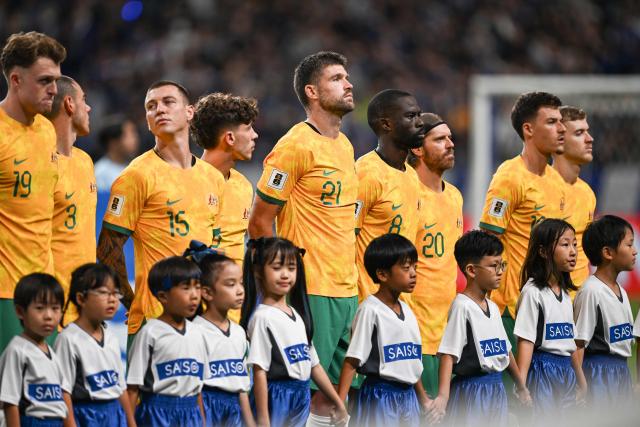 Australia's players line up before the FIFA World Cup 2026 Asian zone qualifiers football between Japan and Australia at Saitama Stadium in Saitama on October 15, 2024. (Photo by Philip FONG / AFP)