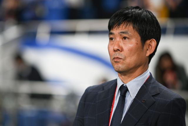 Japan's coach Hajime Moriyasu looks on before the FIFA World Cup 2026 Asian zone qualifiers football between Japan and Australia at Saitama Stadium in Saitama on October 15, 2024. (Photo by Philip FONG / AFP)