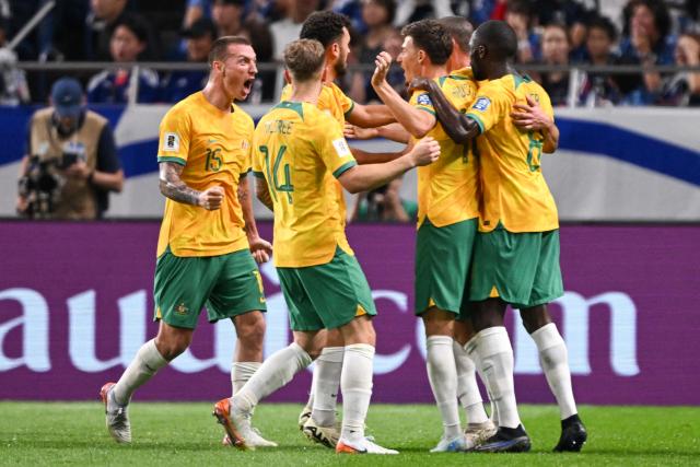 Australia's players after Japan scored an own goal during the FIFA World Cup 2026 Asian zone qualifiers football between Japan and Australia at Saitama Stadium in Saitama on October 15, 2024. (Photo by Philip FONG / AFP)