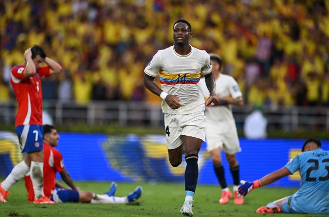 Colombia's forward #14 Jhon Durán celebrates after scoring a goal during the 2026 FIFA World Cup South American qualifiers football match between Colombia and Chile at the Roberto Melendez Metropolitan stadium in Barranquilla, Colombia, on October 15, 2024. (Photo by Raul ARBOLEDA / AFP)