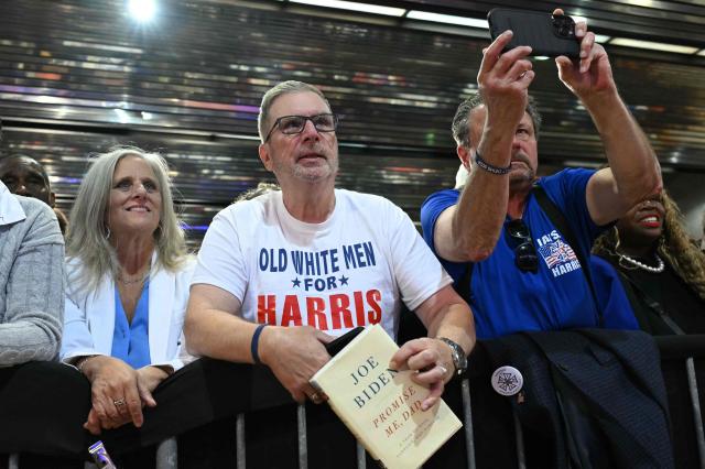 Supporters cheer as US President Joe Biden arrives to speak at a political event in Philadelphia, Pennsylvania on October 15, 2024. (Photo by ANDREW CABALLERO-REYNOLDS / AFP)