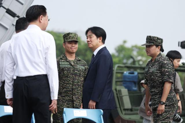 Taiwanese President Lai Ching-te arrives at a naval base in Taoyuan on October 18, 2024. (Photo by I-Hwa CHENG / AFP)