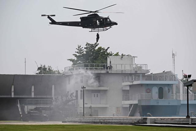 Thai soldiers from the Counter Terrorist Operations Center (CTOC) take part in a counter-terrorism drill at the Armed Forces Development Command in Bangkok on October 18, 2024. (Photo by Lillian SUWANRUMPHA / AFP)