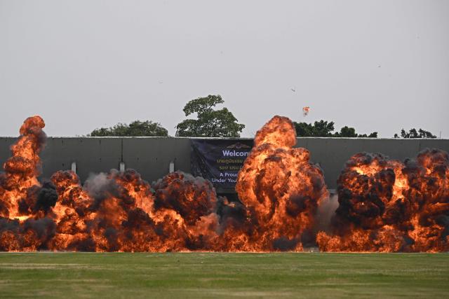 Counter Terrorist Operations Center (CTOC) distraction explosives are detonated during a counter-terrorism drill at the Armed Forces Development Command in Bangkok on October 18, 2024. (Photo by Lillian SUWANRUMPHA / AFP)