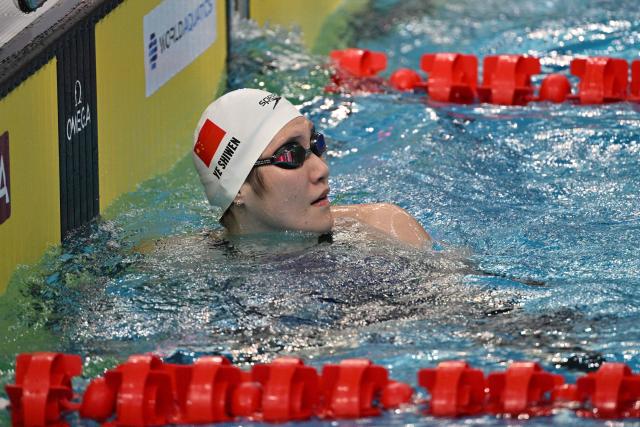 China's Ye Shiwen reacts after competing in the women's 200m breaststroke event during the World Aquatics Swimming World Cup 2024 - Stop 1 at the Oriental Sports Centre Natatorium in Shanghai on October 18, 2024. (Photo by Hector RETAMAL / AFP)