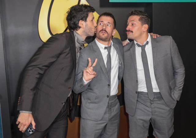 Colombian singer Sebastian Yatra (L) poses with Mauricio Alberto "Mau" Reglero Rodriguez and Ricardo Andres "Ricky" Reglero Rodriguez from Venezuelan duo Mau y Ricky as they attend the Latin Recording Academy's Person Of The Year gala at the Miami Beach Convention Center in Miami Beach, Florida on November 13, 2024. (Photo by Giorgio Viera / AFP)